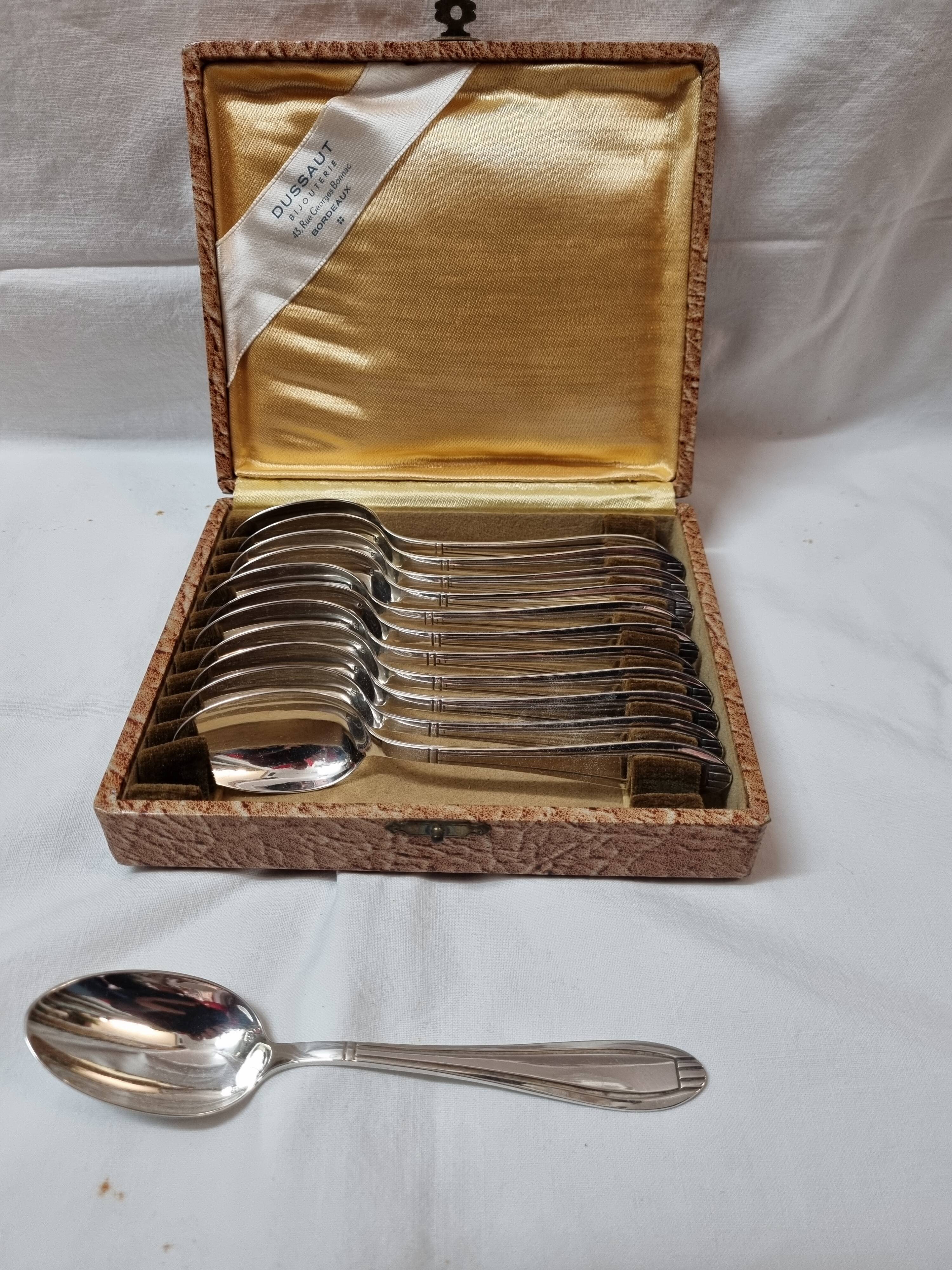 12 teaspoons silver art deco