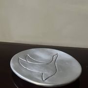 vide poche en aluminium poli, signée et estampillée dans la masse