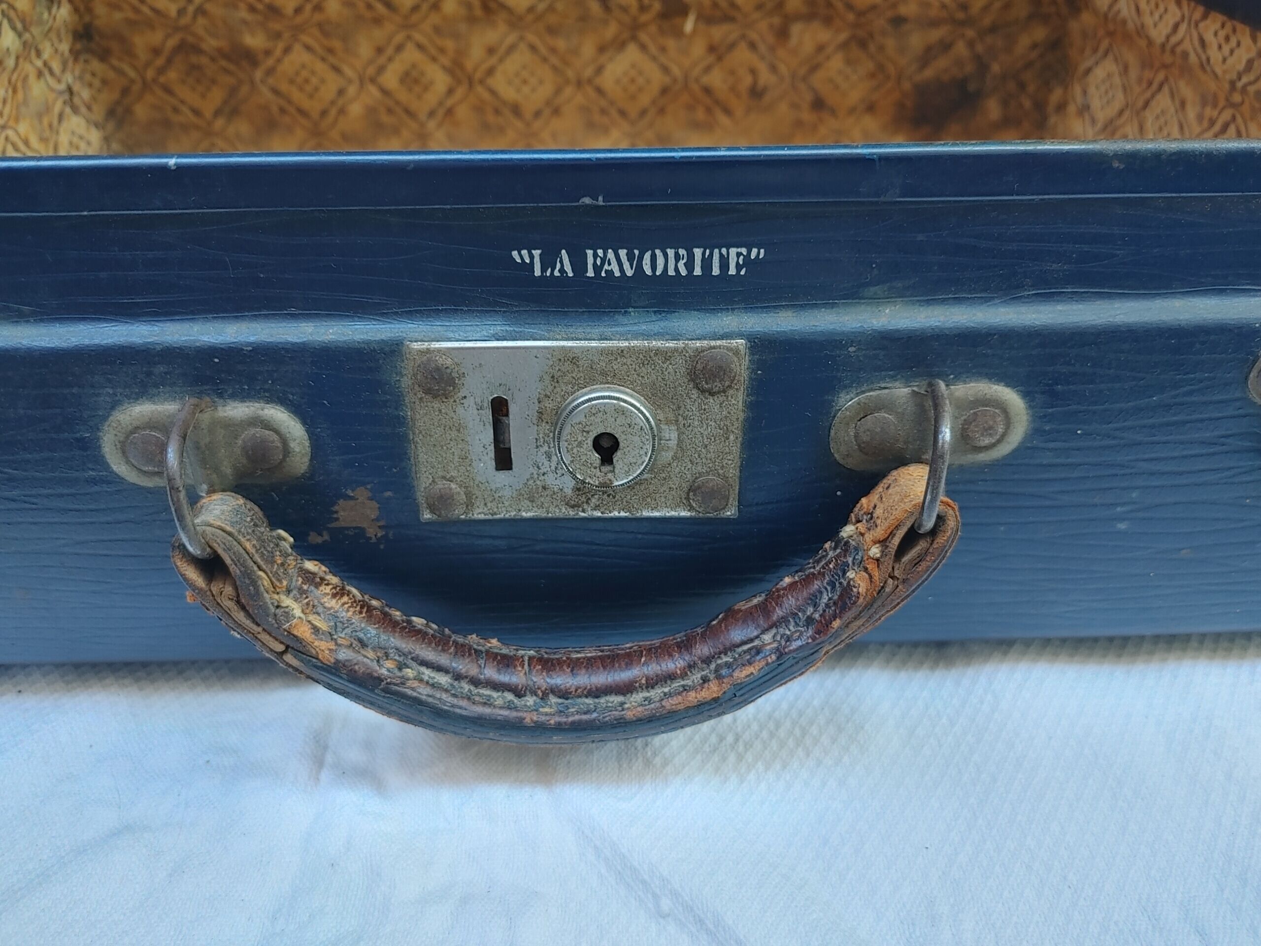 Old suitcase “the favorite” with a paper interior - 1930s/40s