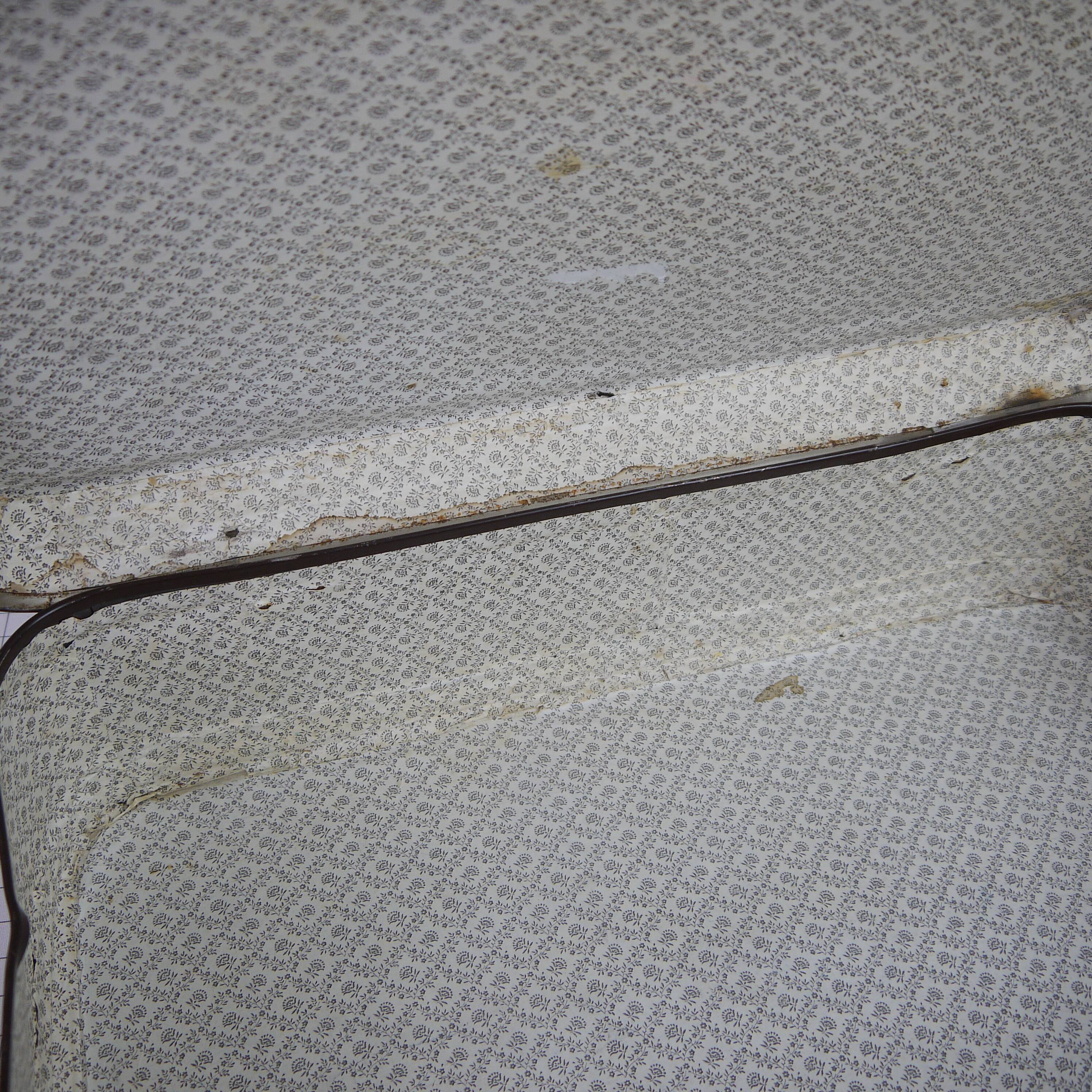 Cardboard and brown leather case