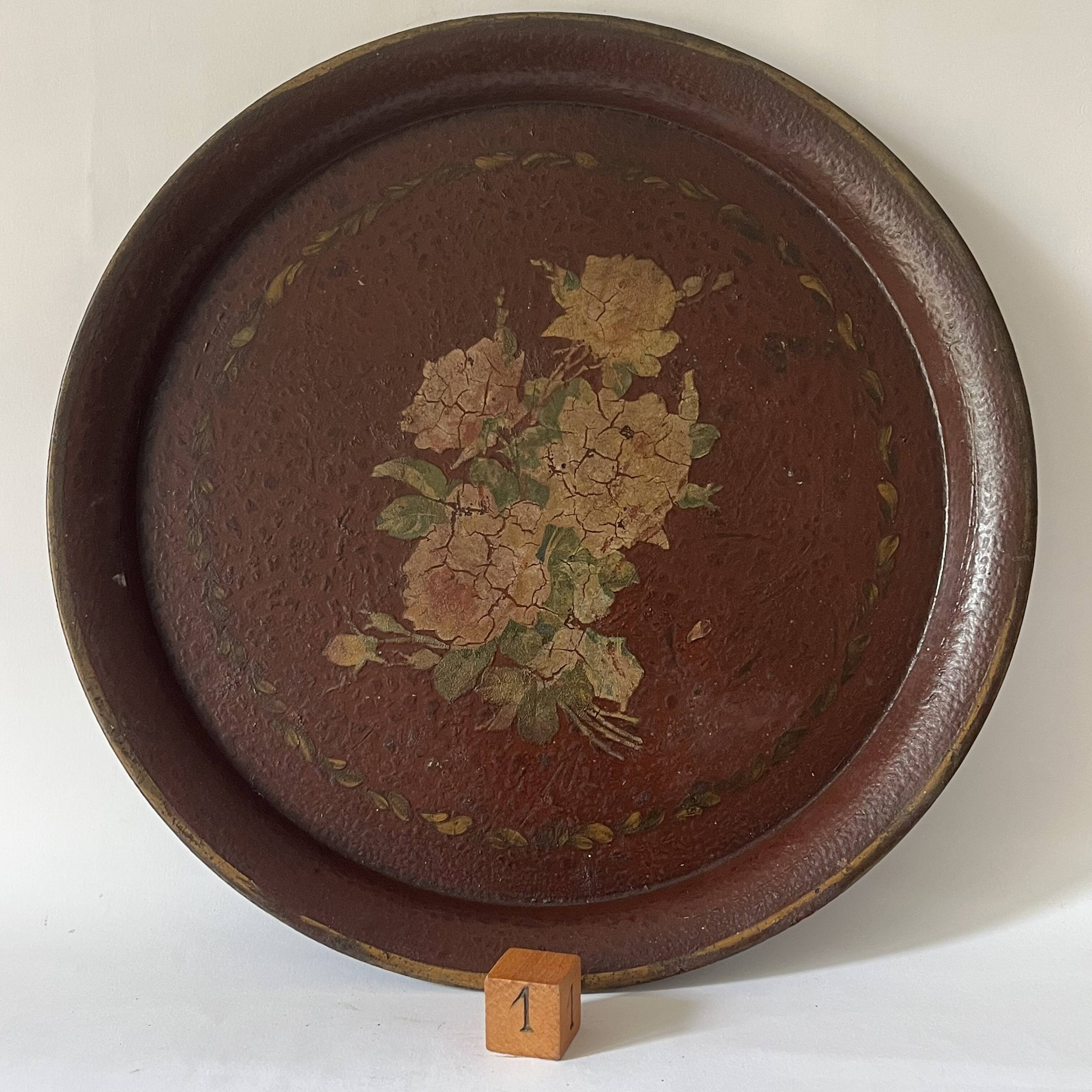 Two old trays on a stand/console.