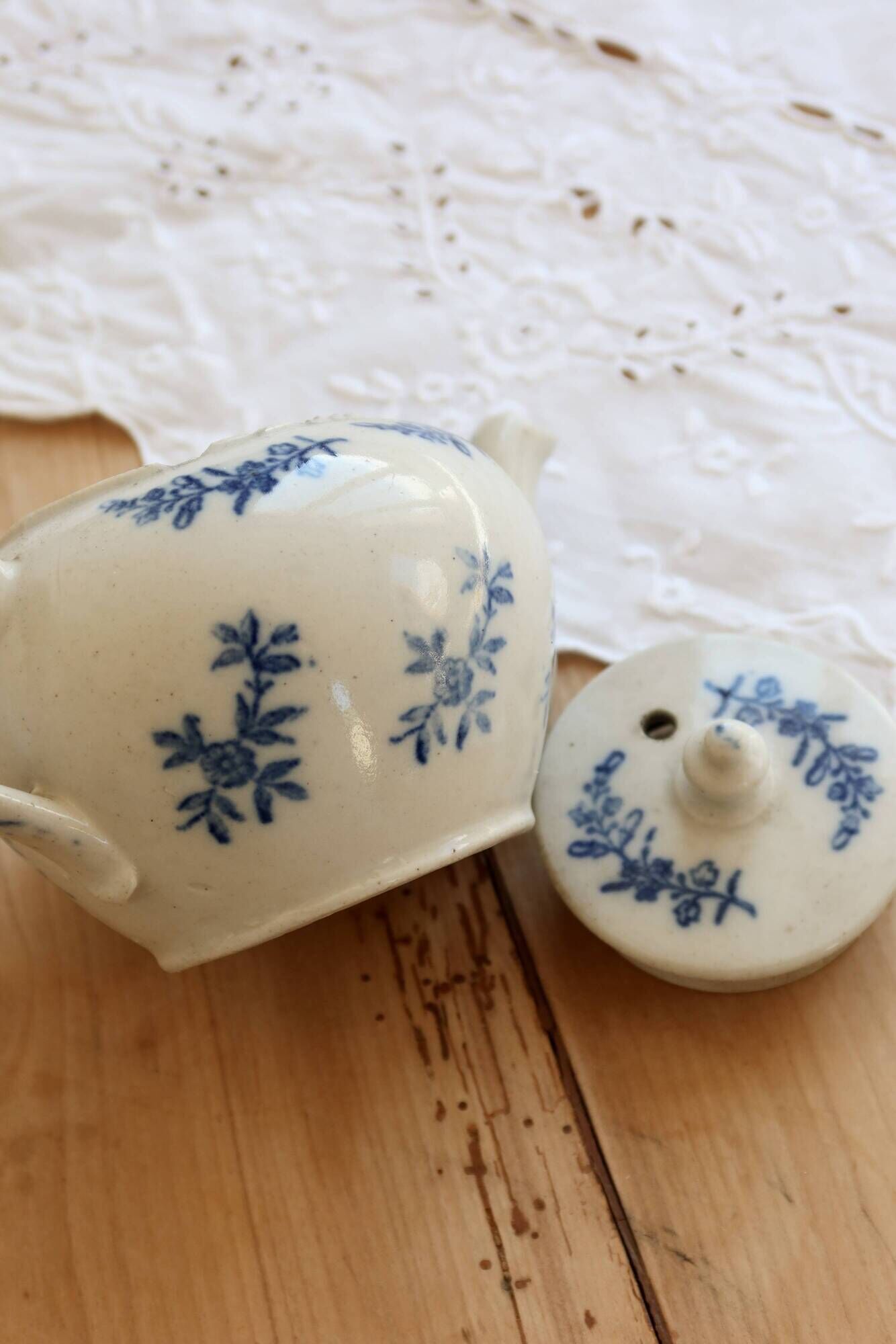 Antique teapot Saint-Uze steel clay with cobalt blue floral decoration.