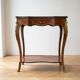 Louis XV console table with marquetry and bronze fittings.
