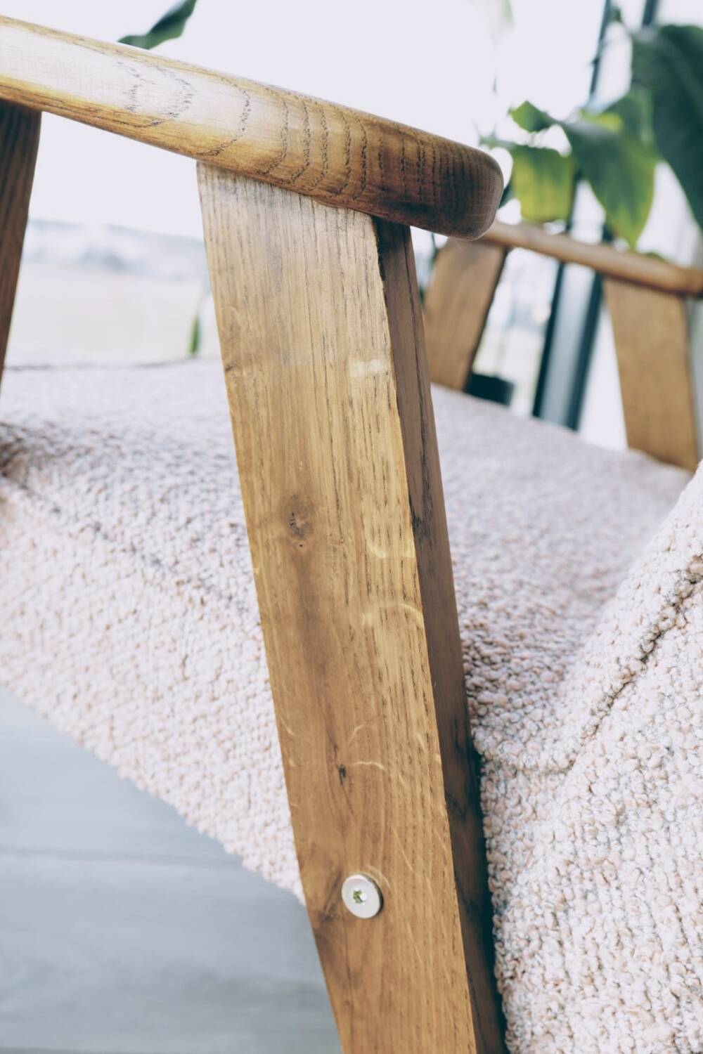 Vintage armchair in oak wood with powder pink boucle design by Chierowski.