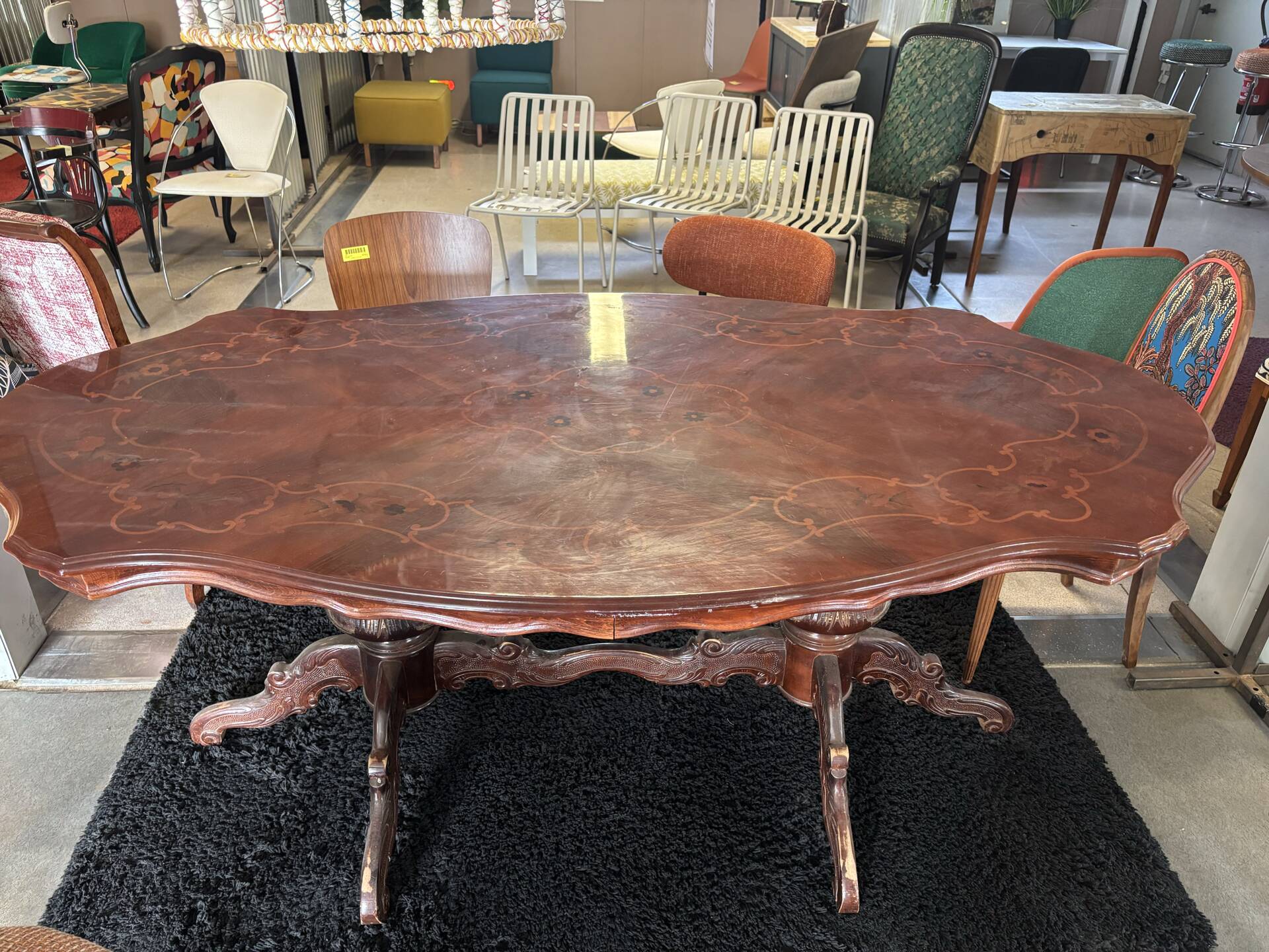 Oval table with marquetry top