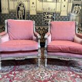 Paire de fauteuils - bergères de style Louis XVI