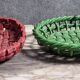Two woven ceramic fruit baskets/centerpieces