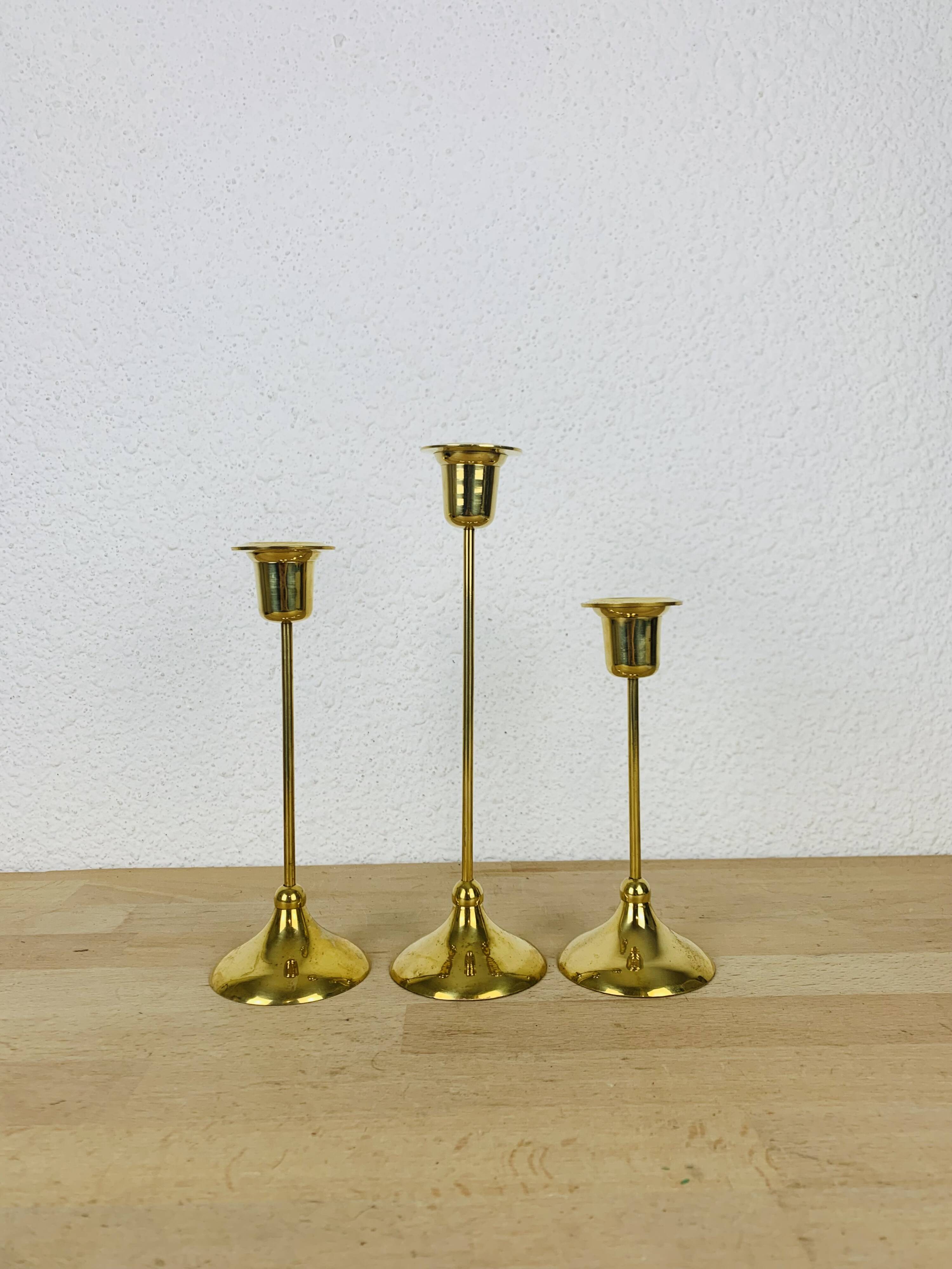 3 Scandinavian style gold-plated brass candle holders