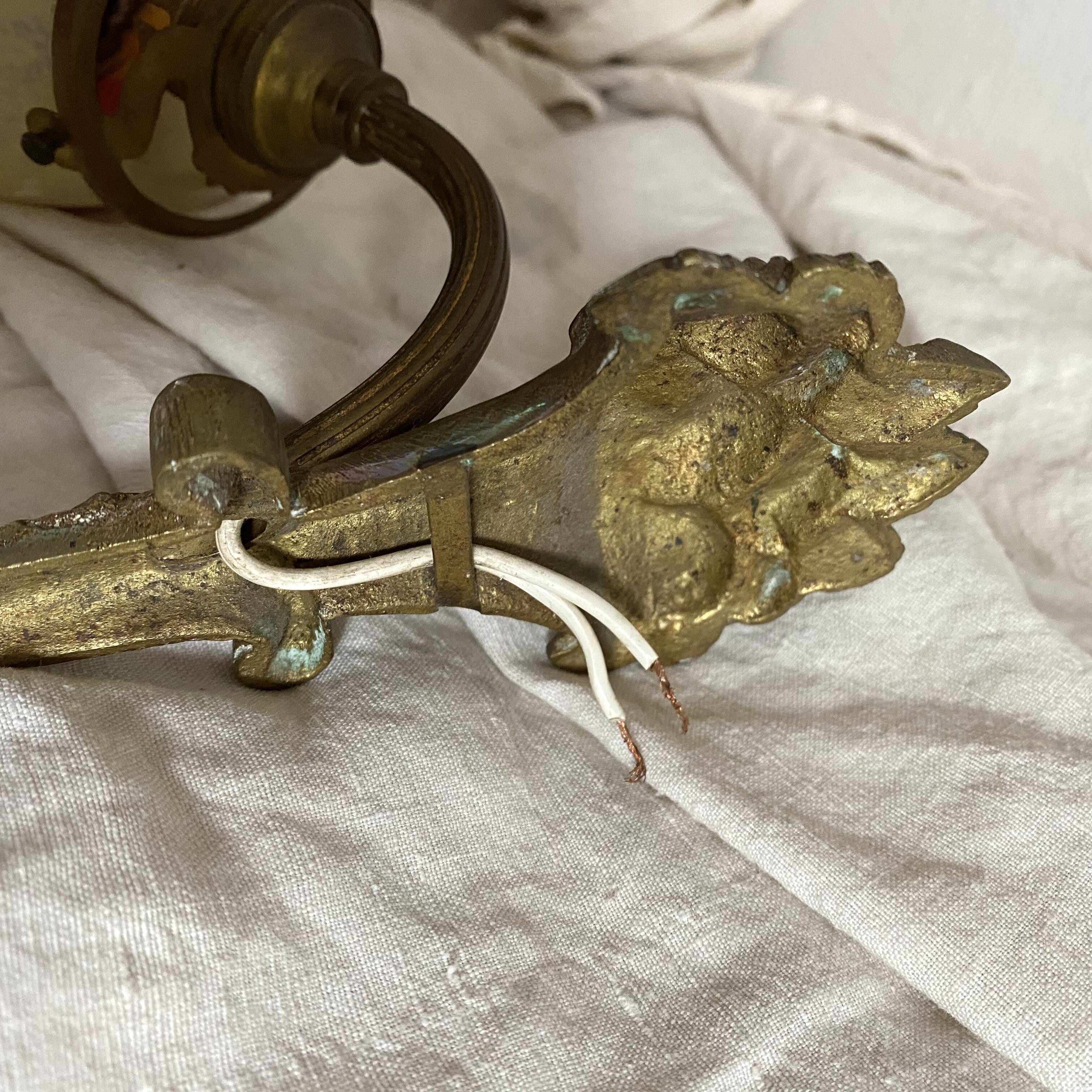 Antique bronze and glass paste wall light