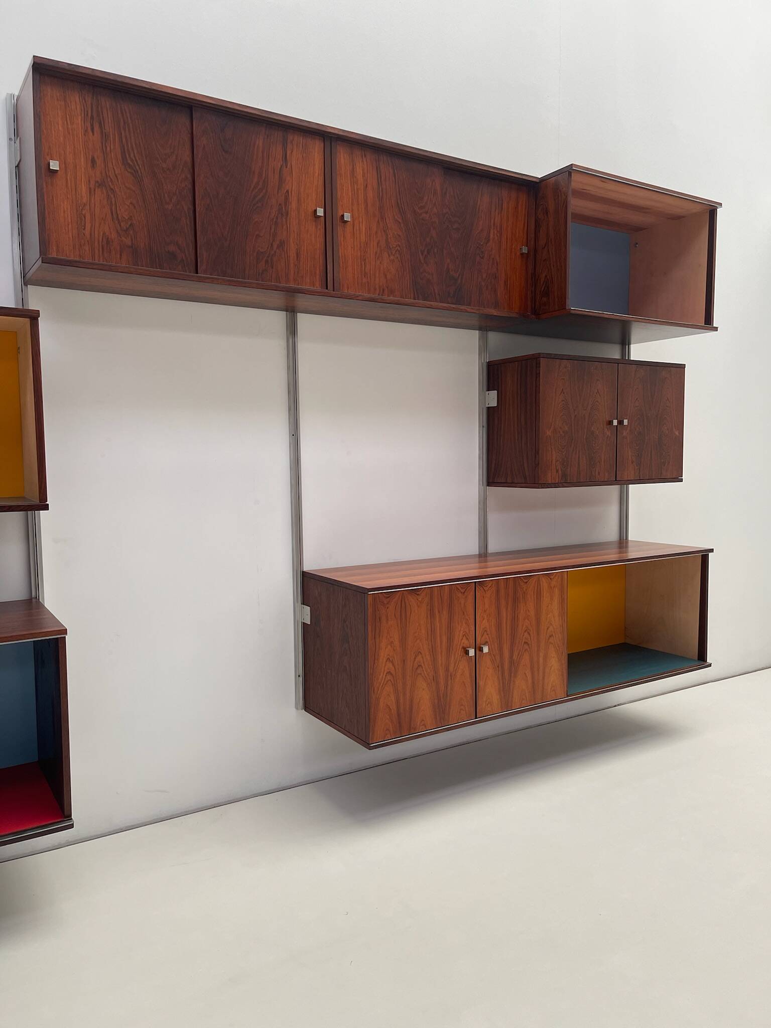 Large colorful wall unit in luxury wood