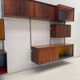 Large colorful wall unit in luxury wood
