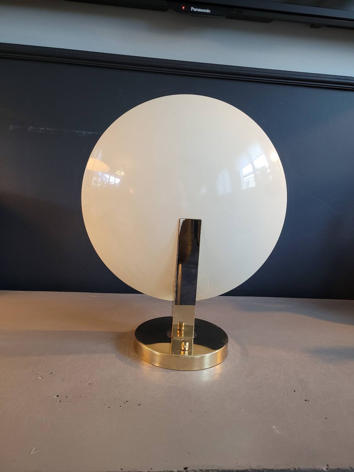 Gold and cream white saucer wall sconce