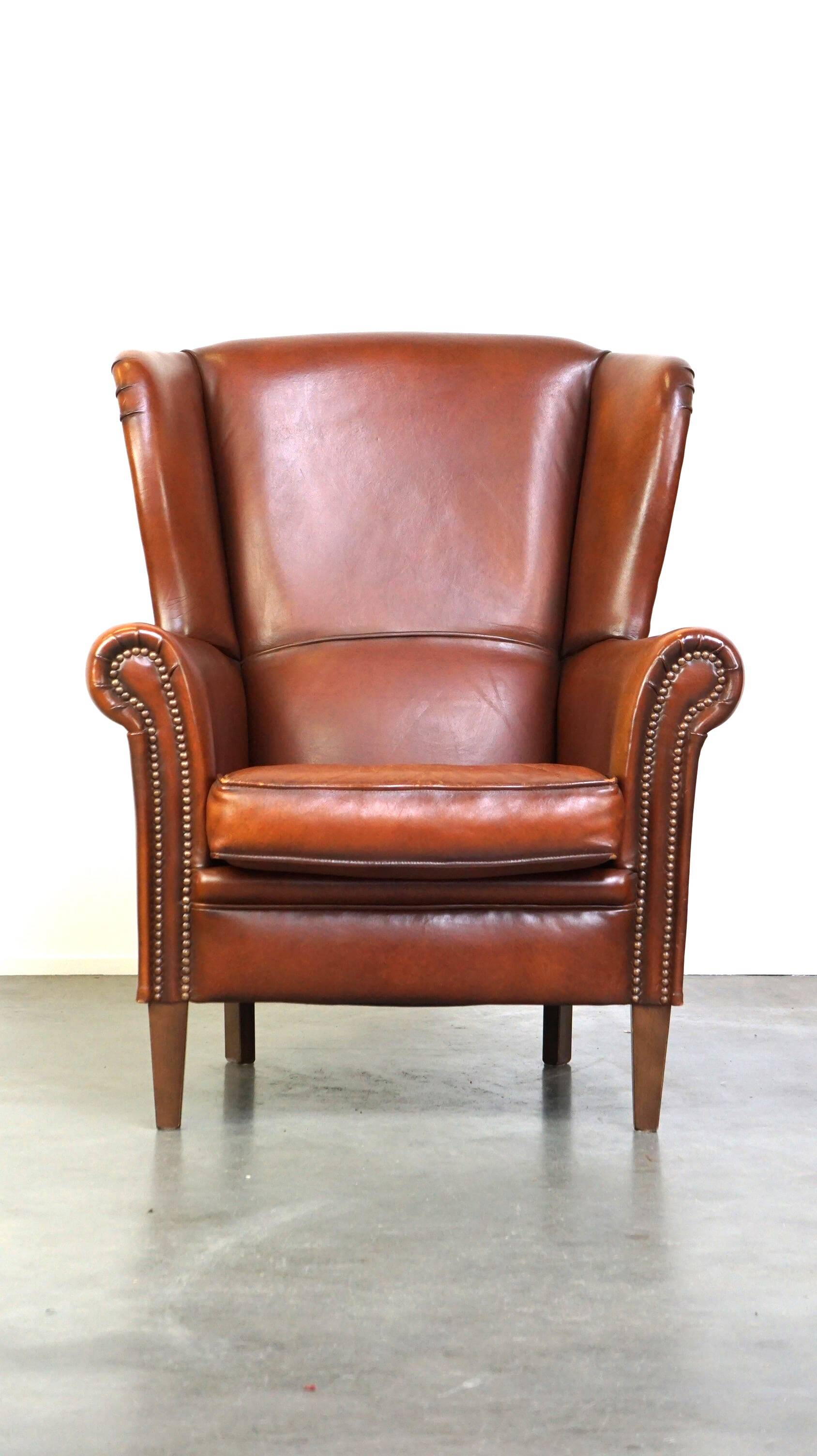 Beautiful classic sheepskin armchair with a beautiful appearance and a comfortable seat