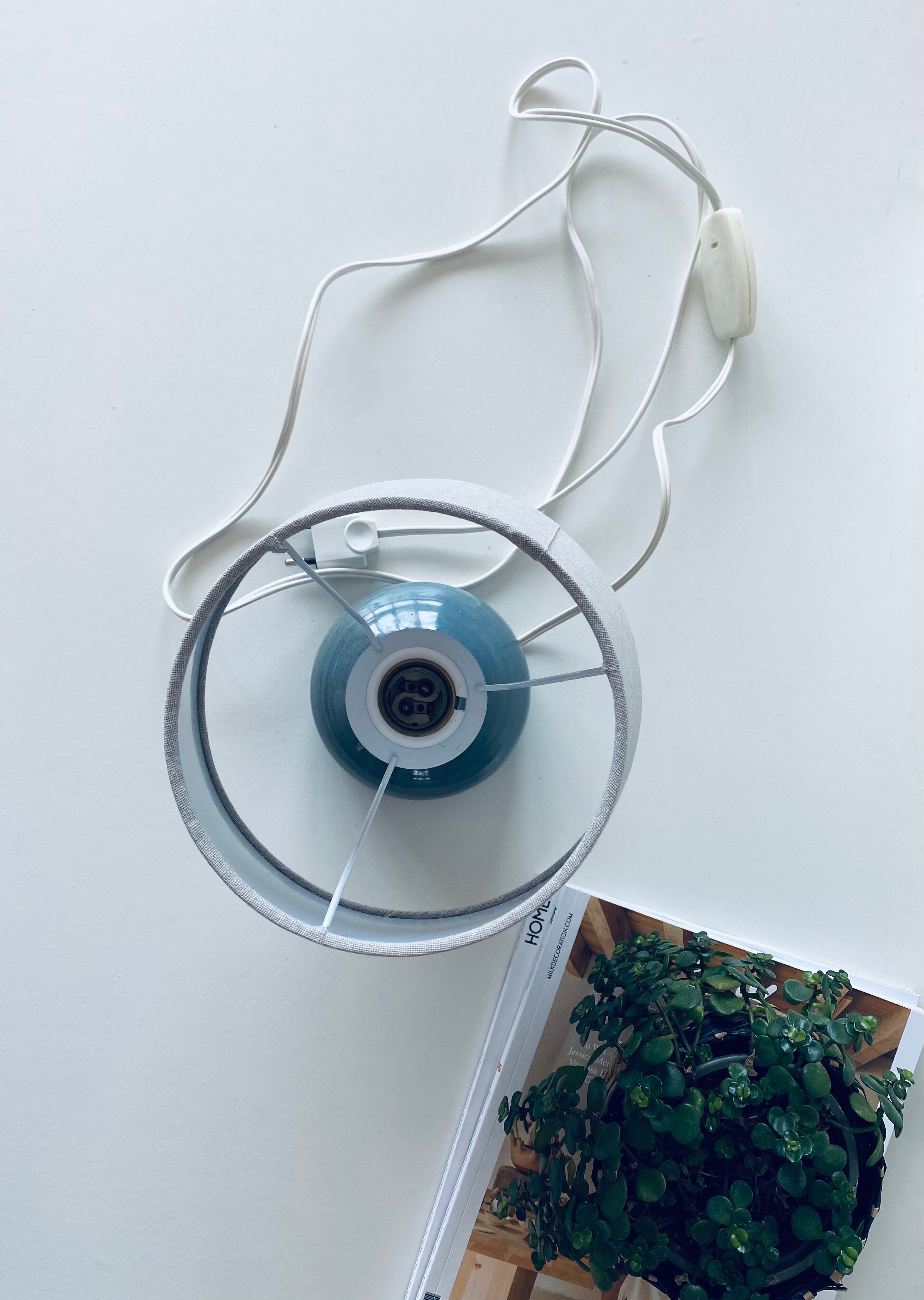 Lamp in enamelled sandstone