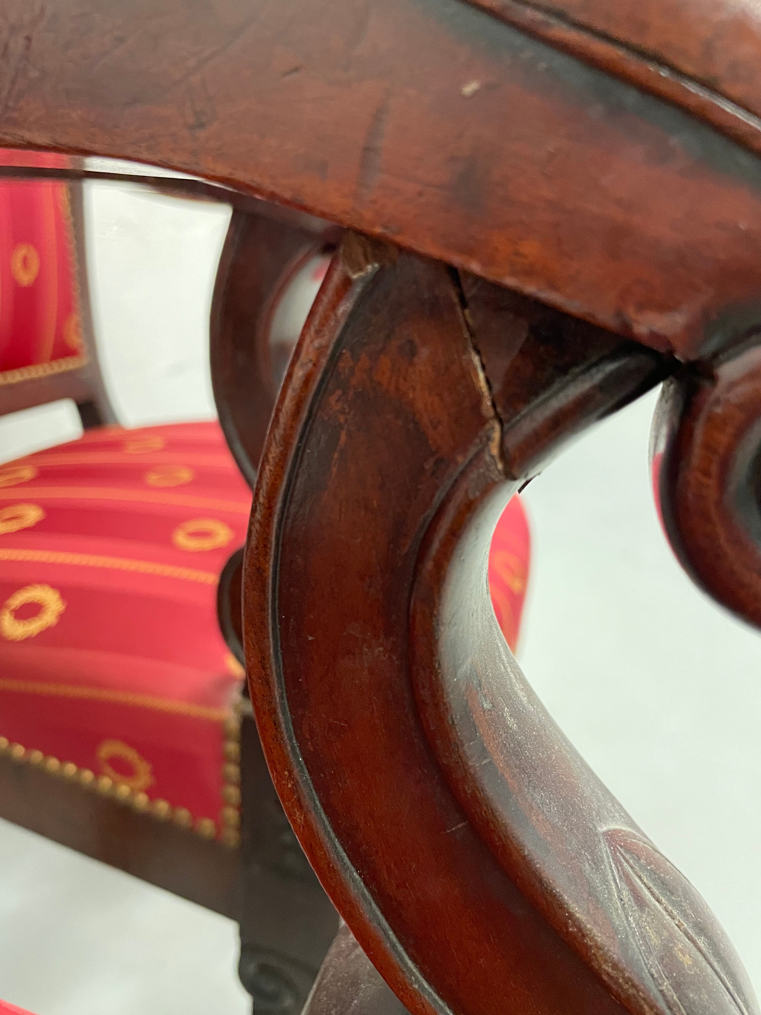 Pair of empire period armchairs in mahogany and silk