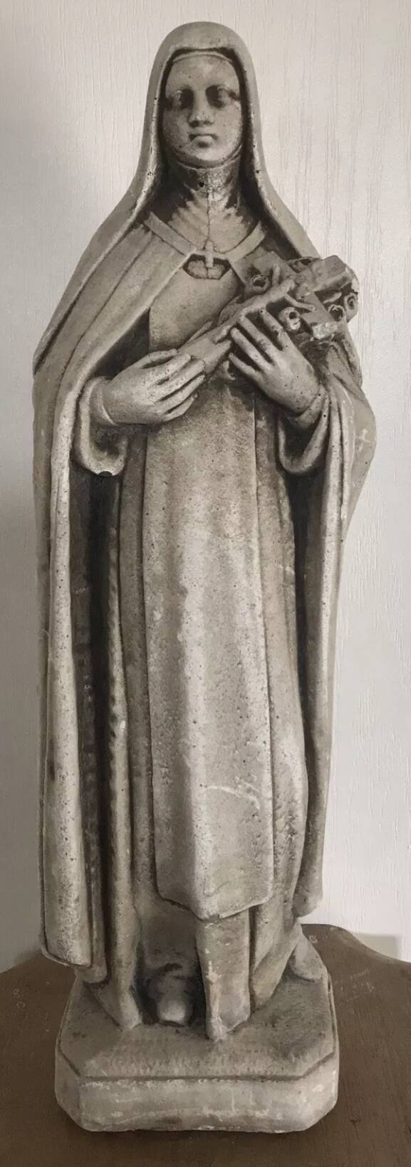 Religious statue of sainte therese of lisieux “the little flower of jesus” in stone