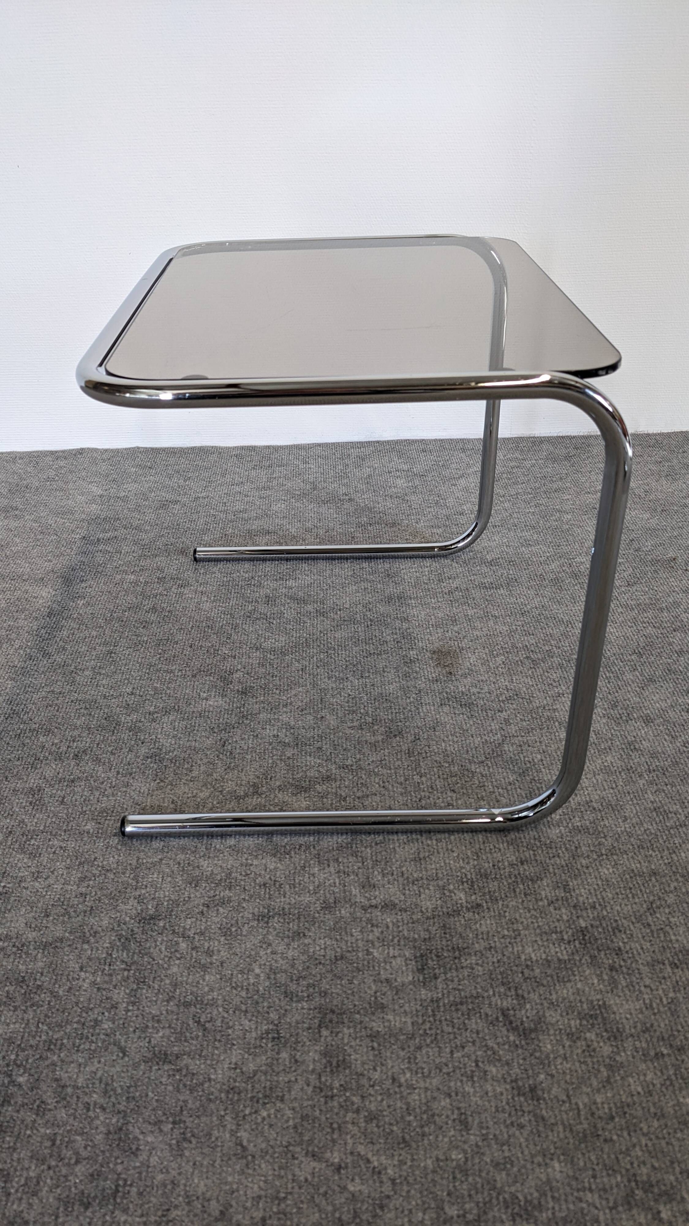 Nested tables with tubular chrome and smoked glass, France 1970.
