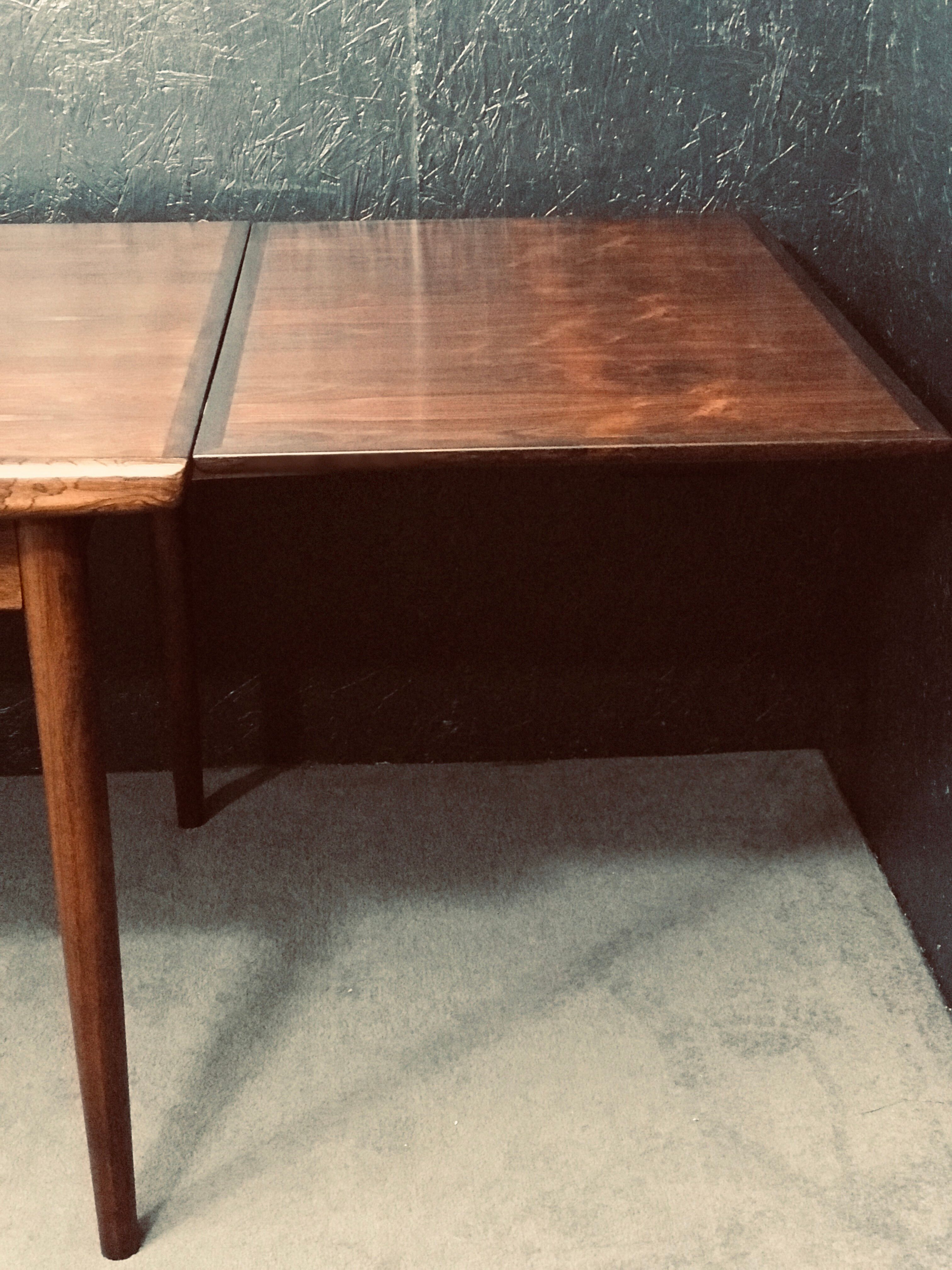 Mid-century danish rosewood extending table.