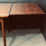 Table extensible en palissandre danois du milieu du siècle.