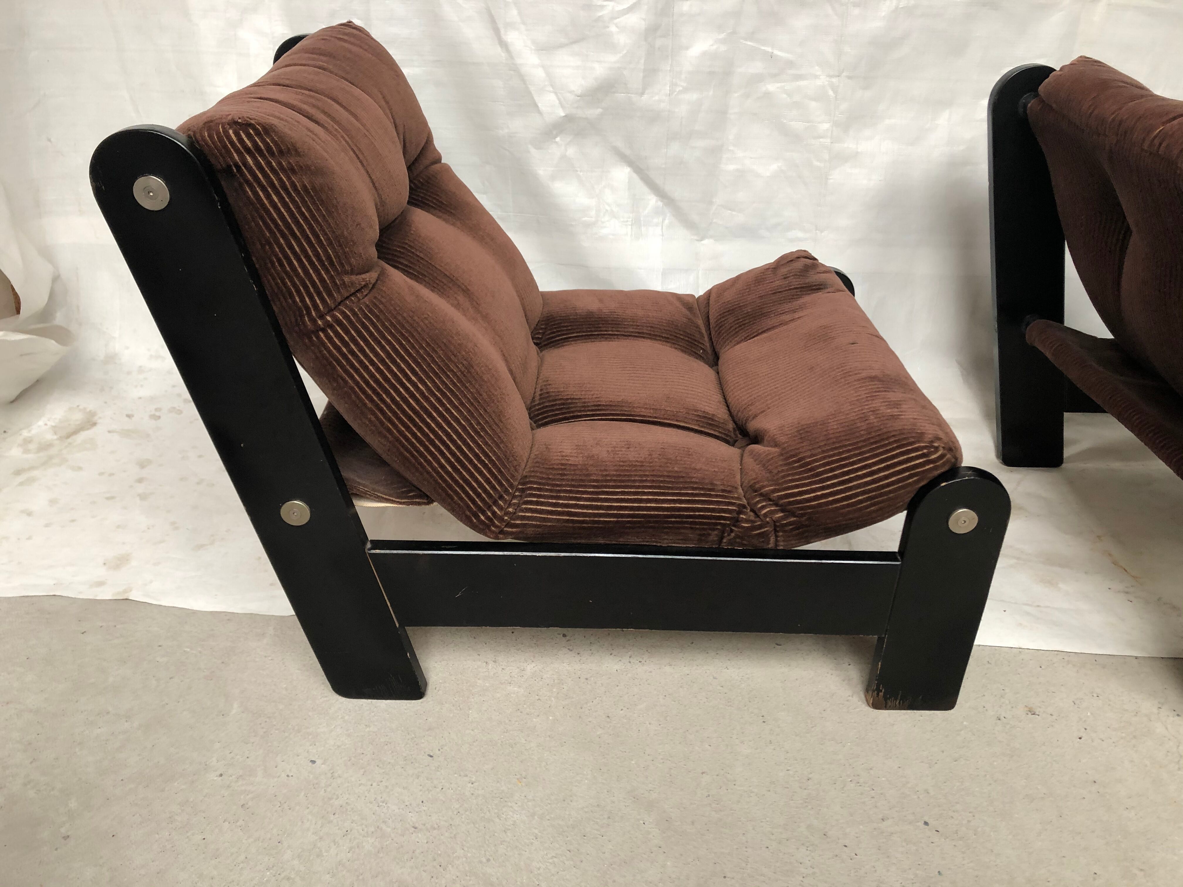 Modernist armchairs wood heaters and brown velvet vintage 70s