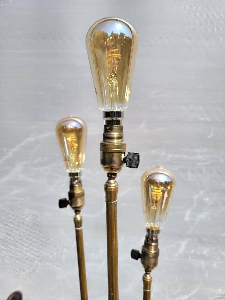 Three-light painter's table lamp in brass from the 1950s.