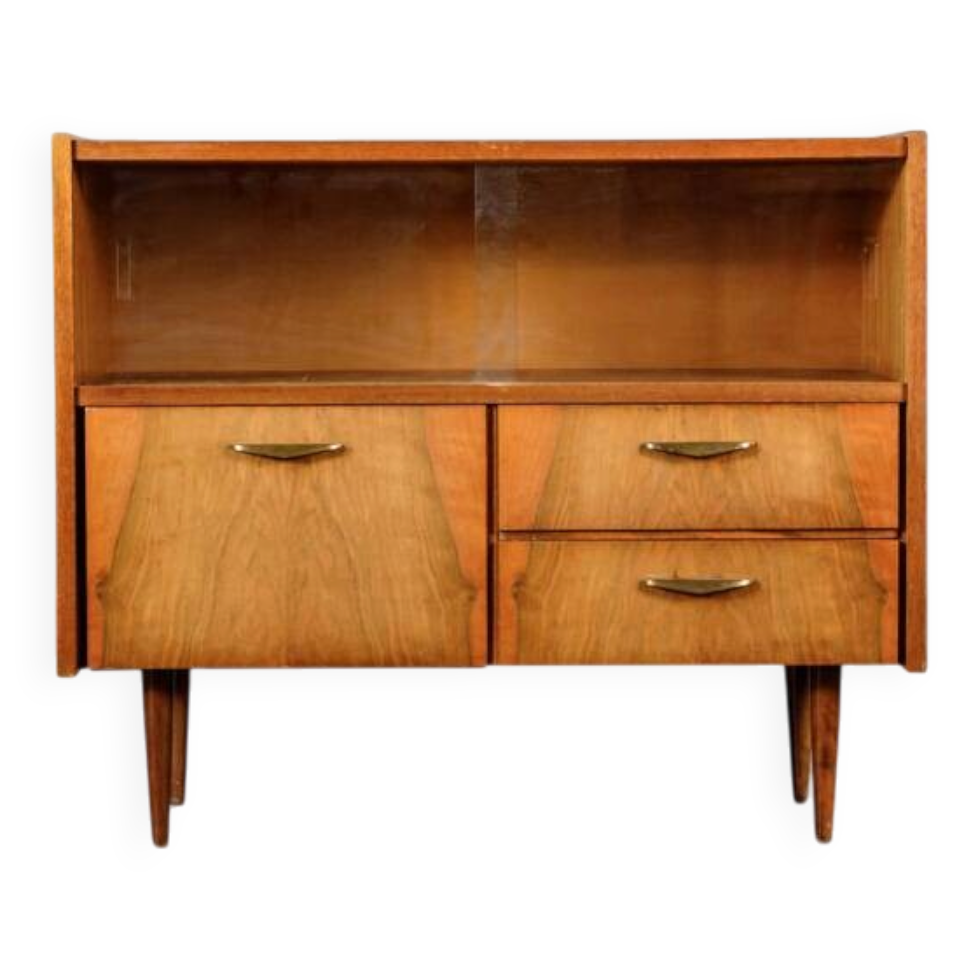 Old TV cabinet with brass handles.