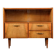 Old TV cabinet with brass handles.