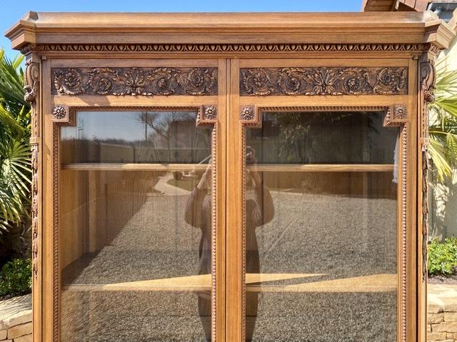 Louis XVI-style walnut library showcase