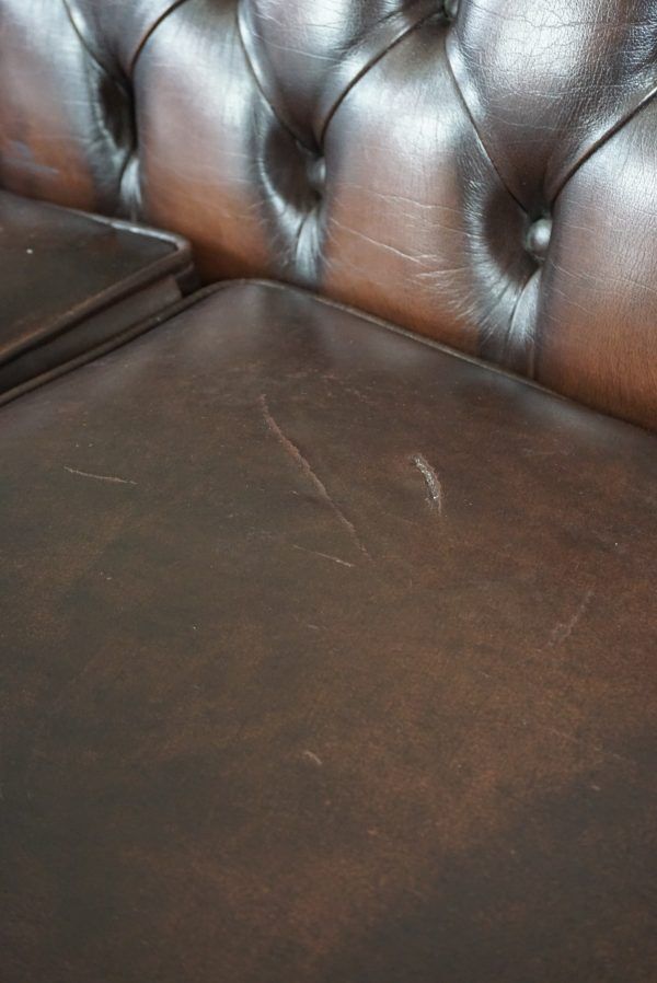 Chesterfield sofa in cowhide, 4 seats
