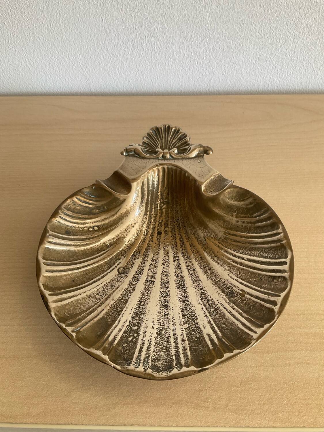 Vintage bronze shell emptier