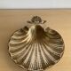 Vintage bronze shell emptier