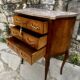 Charming small chest of drawers in precious wood marquetry.