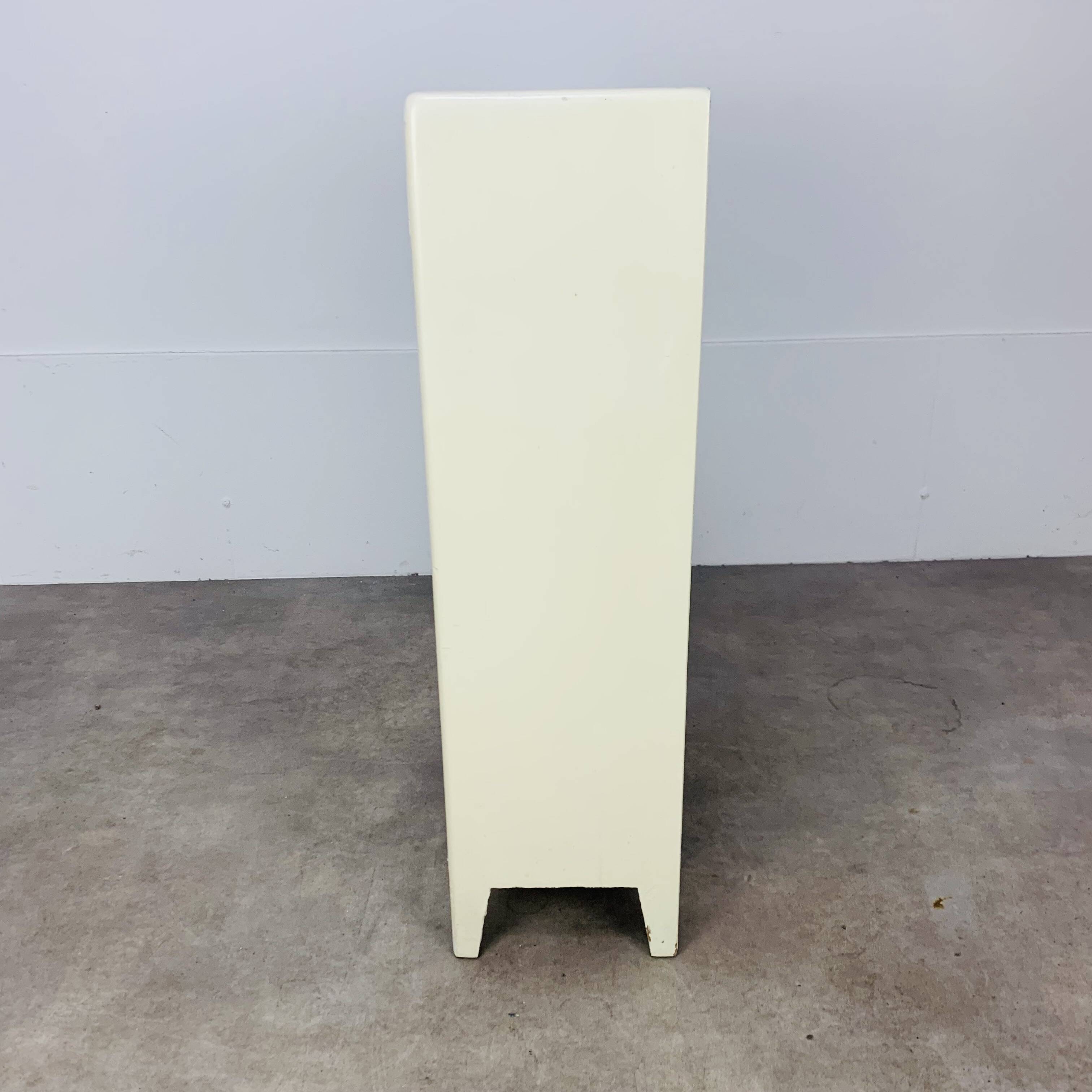 White wood convenient storage unit from the 1950s