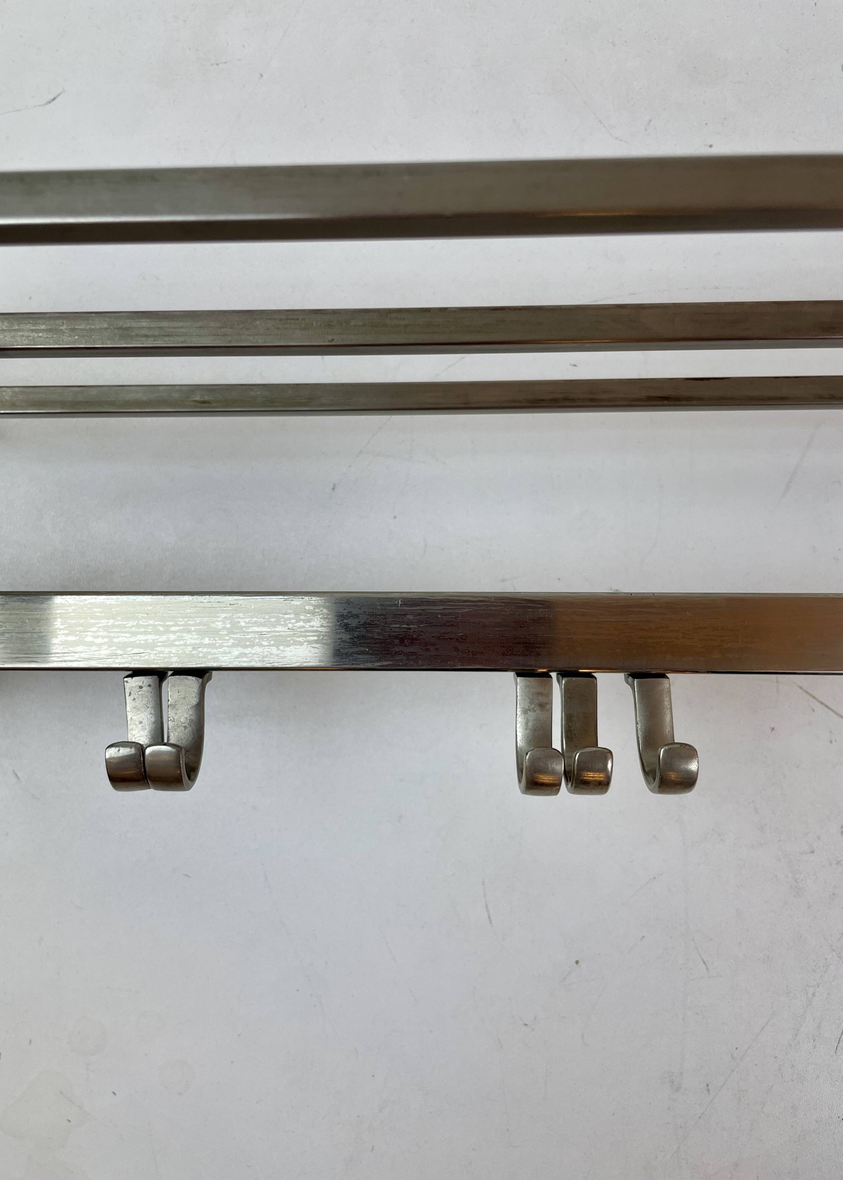 Art Deco coat rack in the style of a train carriage, 1930s.