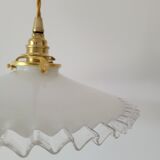 Serrated opaline suspension