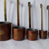Pots à mesure en cuivre