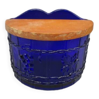 Old salt box in blue glass