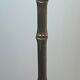 Bronze floor lamp in faux-bamboo style by the Baguès house.