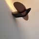 Vintage modernist wall lamp, black lacquered metal and wood, France 1980s