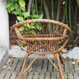 Old rattan basket armchair