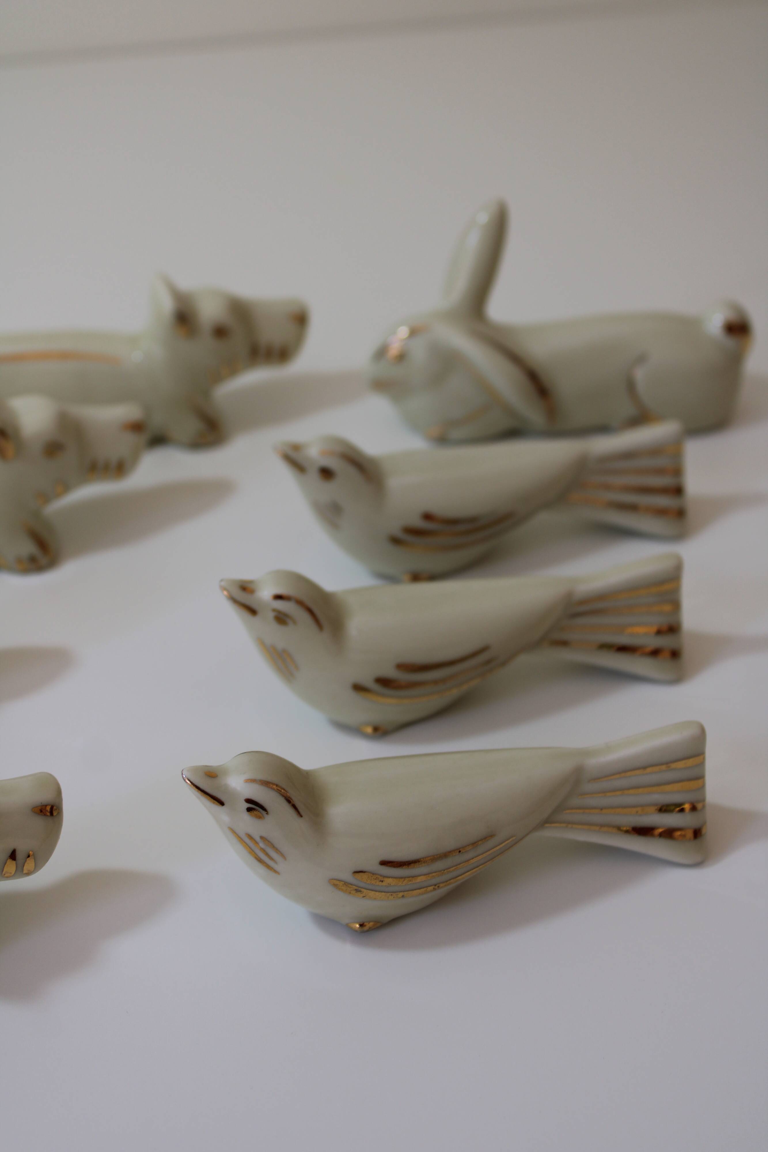 8 portes couteaux animaux porcelaine de Limoges vintage