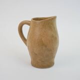 Small brown stoneware pitcher