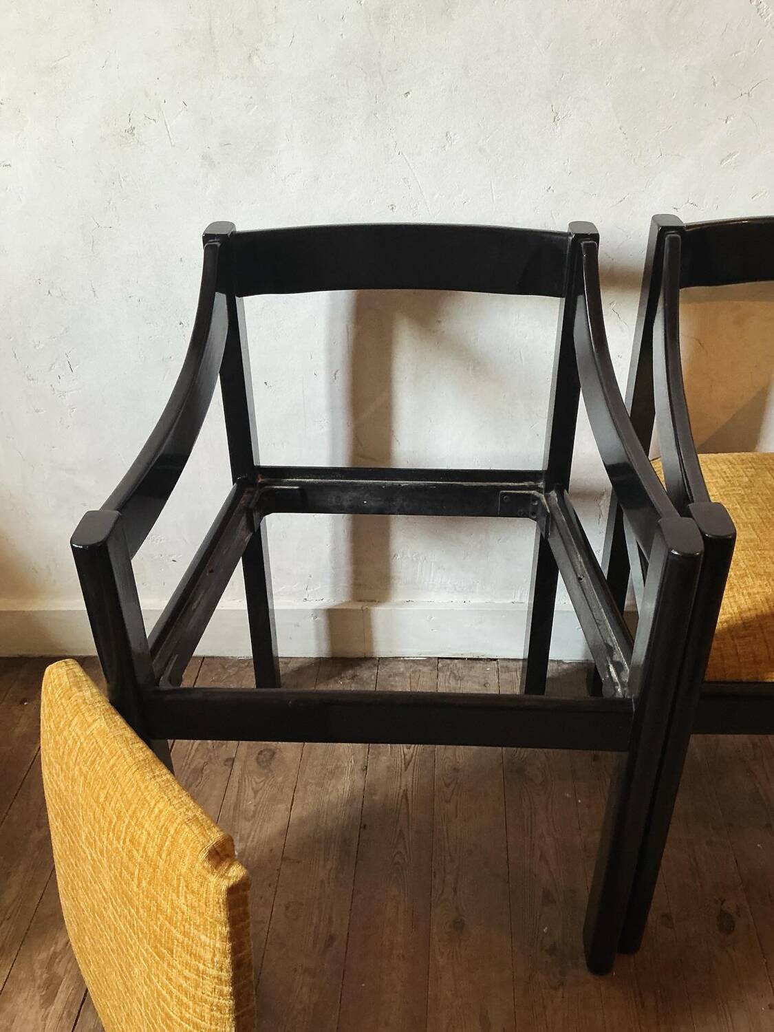 Four designer armchairs