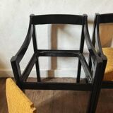 Four designer armchairs