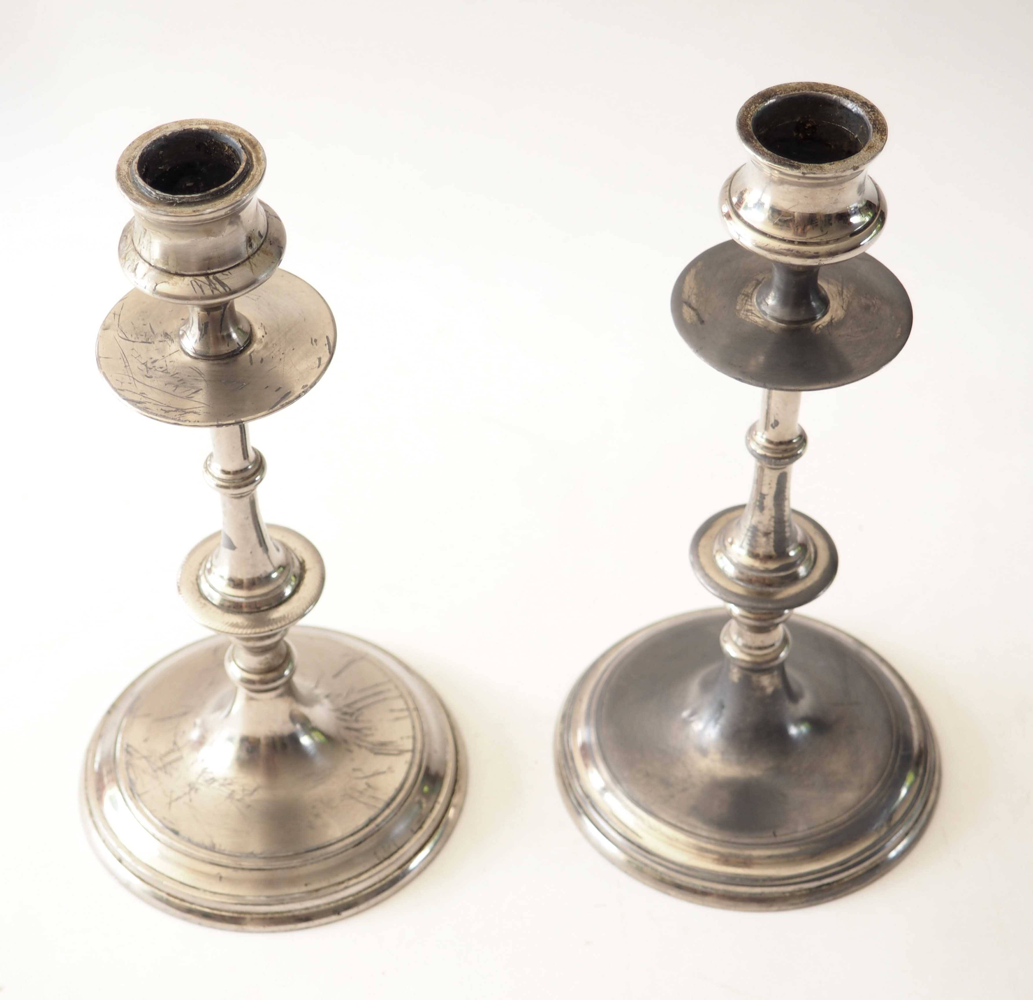 Pair of metal candlesticks