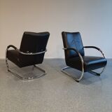 Pair of tubular armchairs