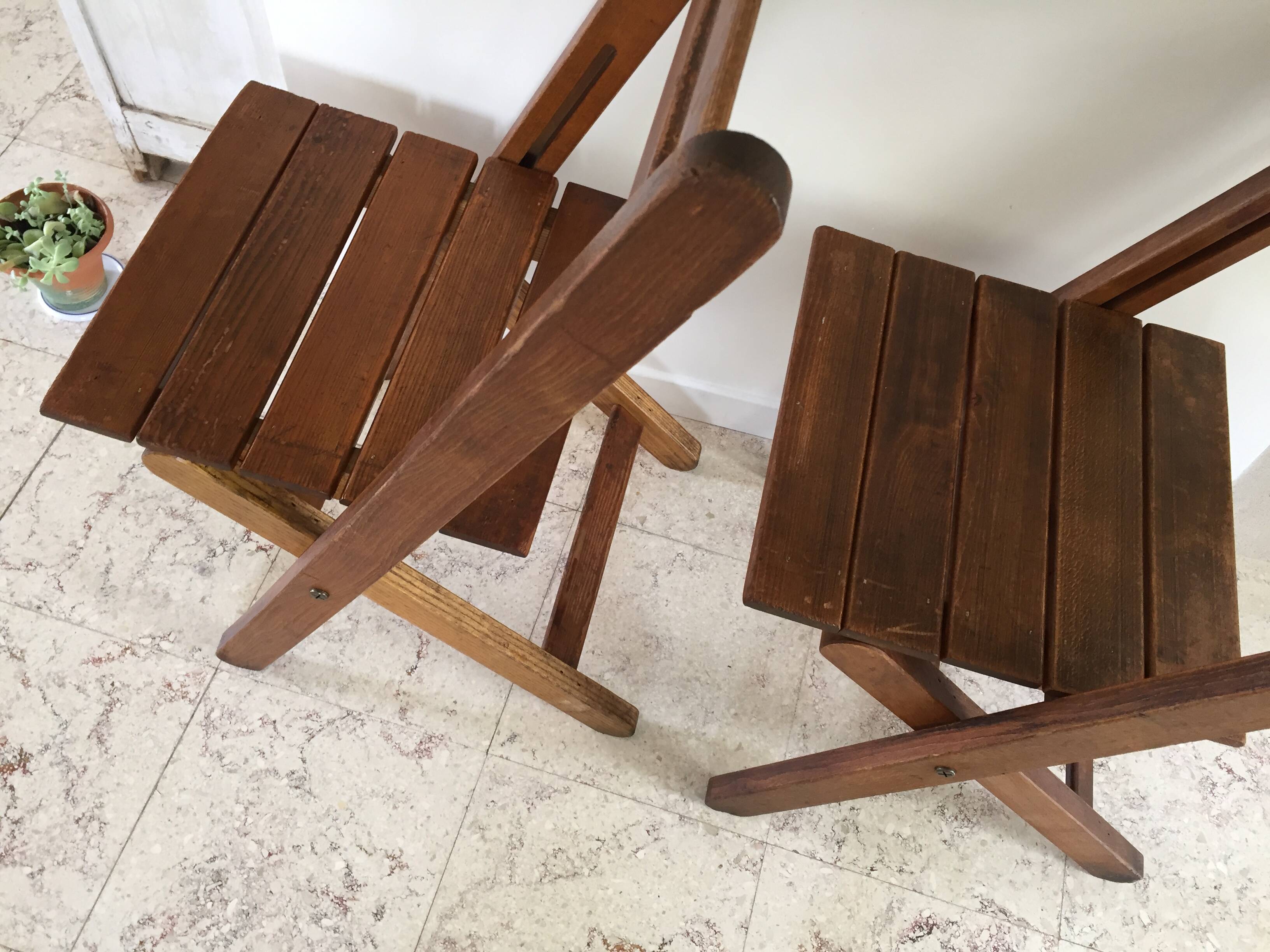 Folding chairs "by the wood fire"