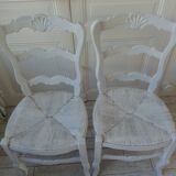 Duo of country-style chairs re-enchanted in pearl gray.