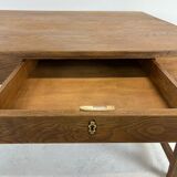 Two-sided oak work table, with 4 drawers