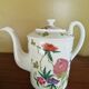 Limoges porcelain coffee pot, teapot or teapot by Reynaud et Cie.